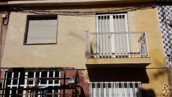 La restauración de la fachada de la casa.Murcia.Cartagena.