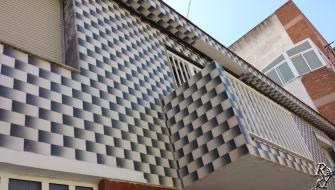 La restauración de la fachada de la casa.Murcia.Cartagena.