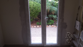 Replacing old windows and wooden doors to new pvc. Spain, Murcia,  Mar Menor