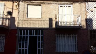 La restauración de la fachada de la casa.Murcia.Cartagena.