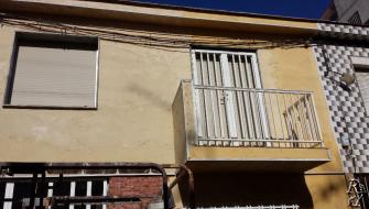 La restauración de la fachada de la casa.Murcia.Cartagena.